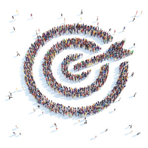A large group of people in the form of a target. White background.